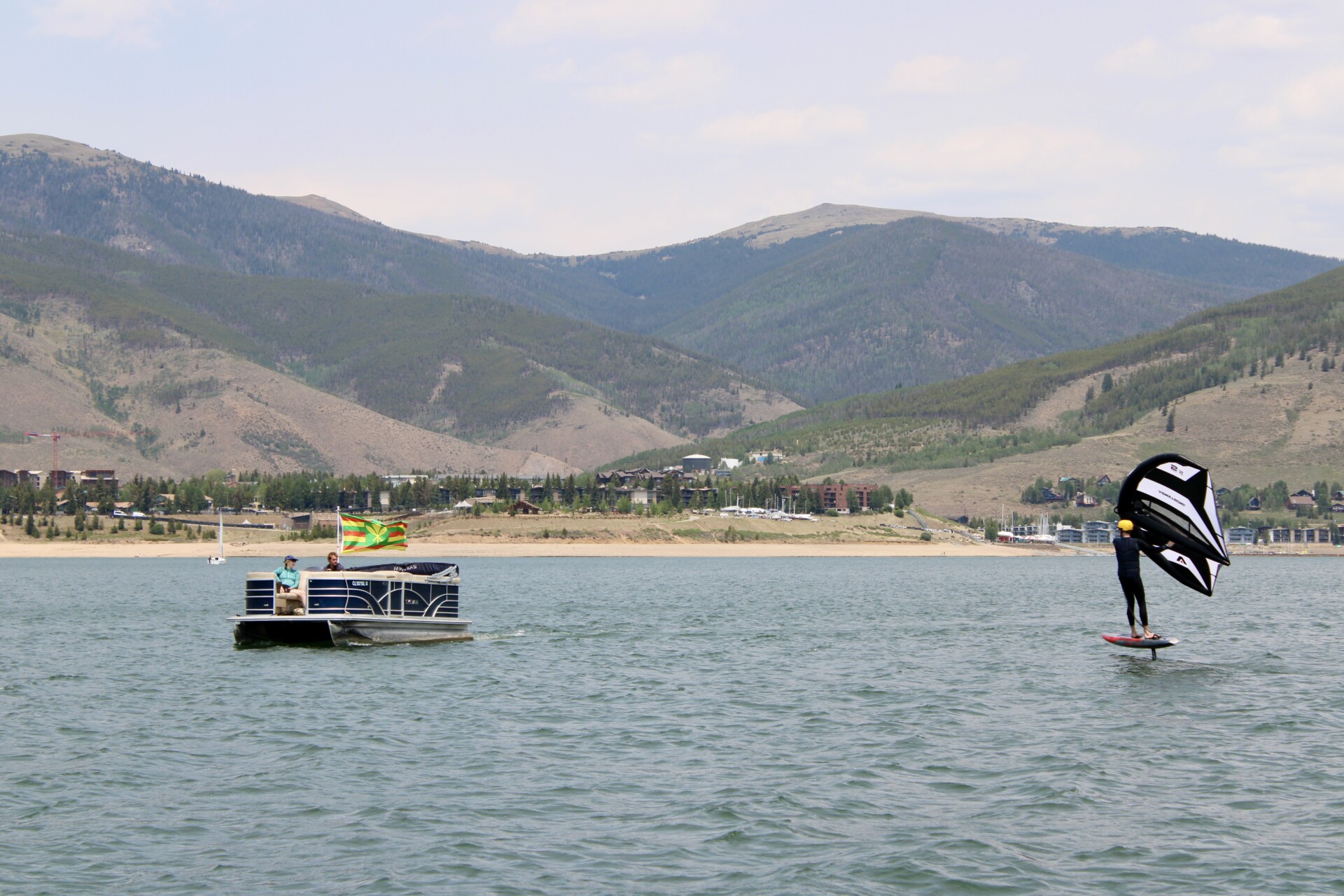 Wingfoiling rider flying above the water on Lake Dillon