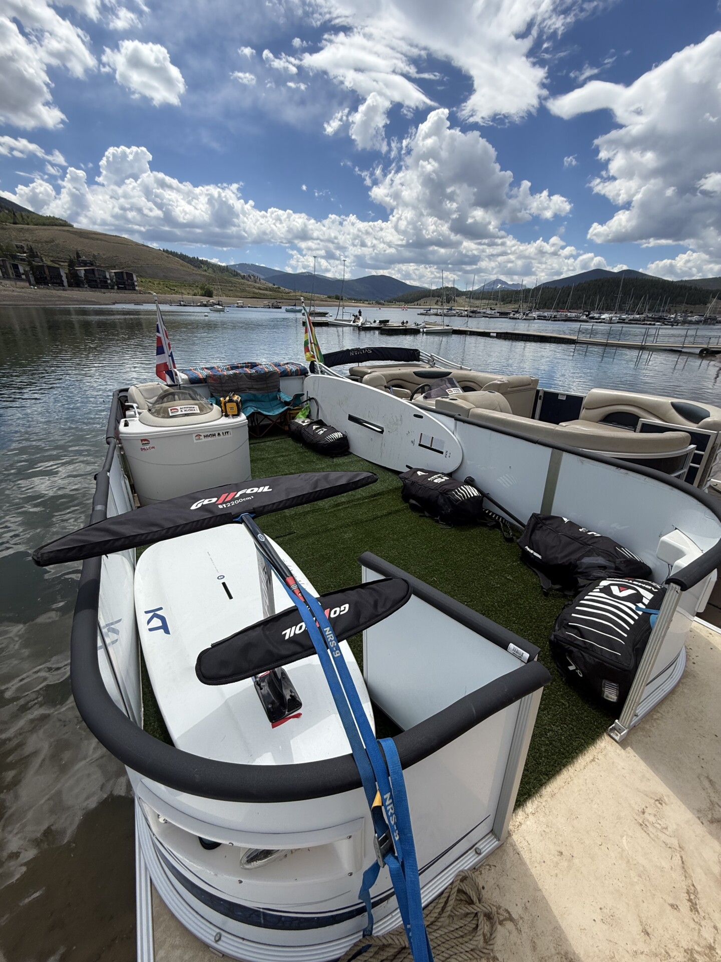 Wingfoiling rider carrying foil gear at Lake Dillon
