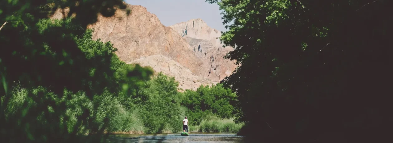 Paddleboarder on a scenic Colorado river