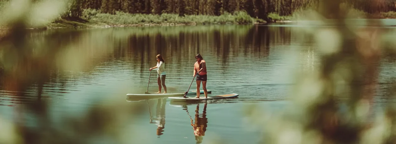 Paddleboarders enjoying a summer morning on Lake Dillon near Dillon Marina