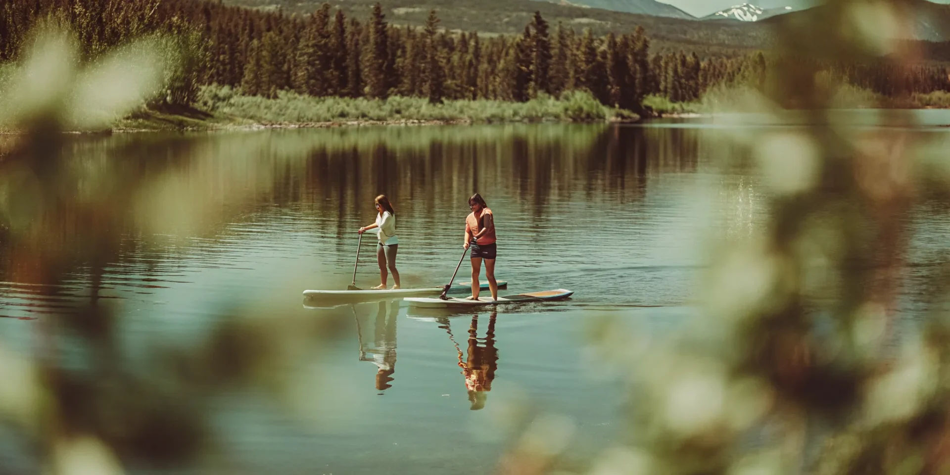 Paddleboarders enjoying a summer morning on Lake Dillon near Dillon Marina