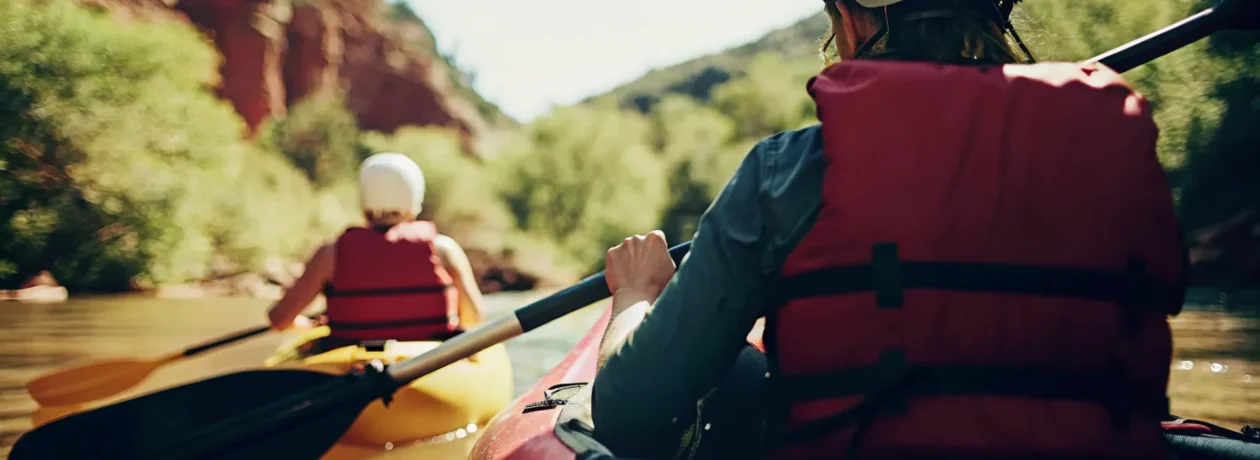 First-time paddler enjoying duckie rafting Colorado