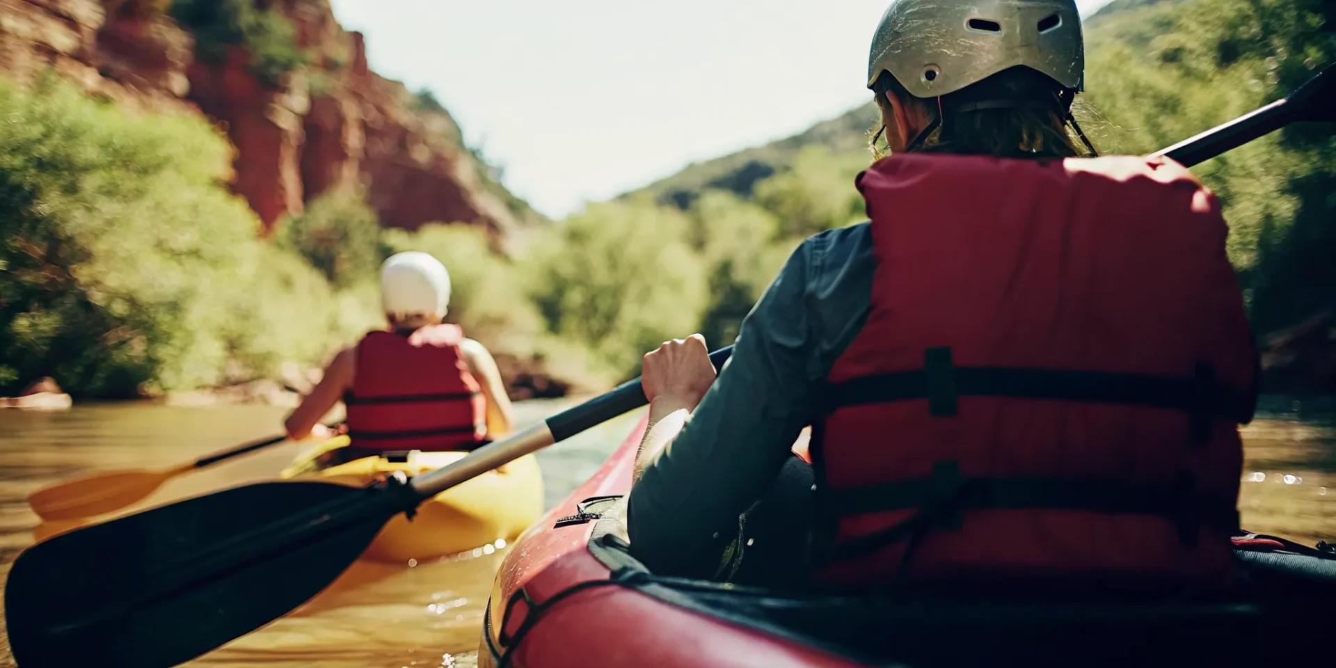 First-time paddler enjoying duckie rafting Colorado