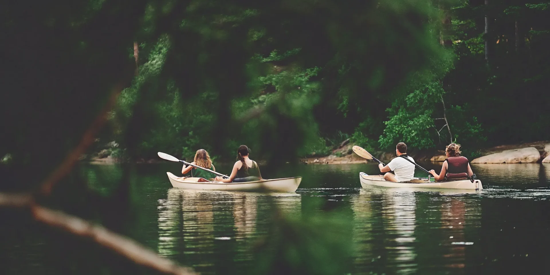 Beginner kayakers paddling on Lake Dillon in Colorado